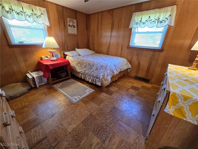 5294 Cottage Dr, Mecca, OH 44410 - bedroom with visible vents and wooden walls