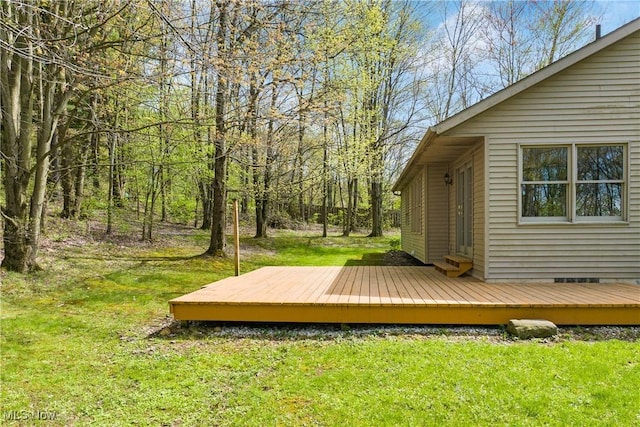 view of yard with a wooden deck