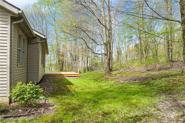 view of yard featuring a deck