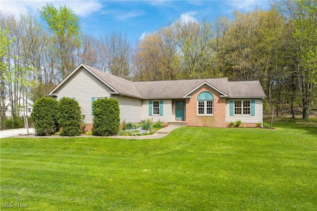 ranch-style home featuring a front yard