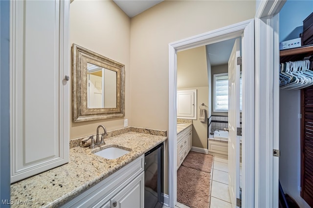 1432 Lake Vue Dr, Roaming Shores, OH 44085 - full bathroom with vanity, a bathing tub, tile patterned floors, and beverage cooler