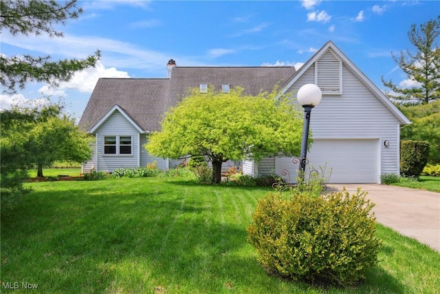 5420 Crystal Cove Cir, Stow, OH 44224 - view of front of house featuring roof with shingles, an attached garage, driveway, and a front yard