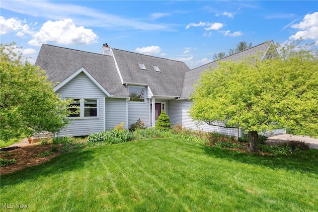5420 Crystal Cove Cir, Stow, OH 44224 - rear view of house featuring a lawn, a chimney, and roof with shingles