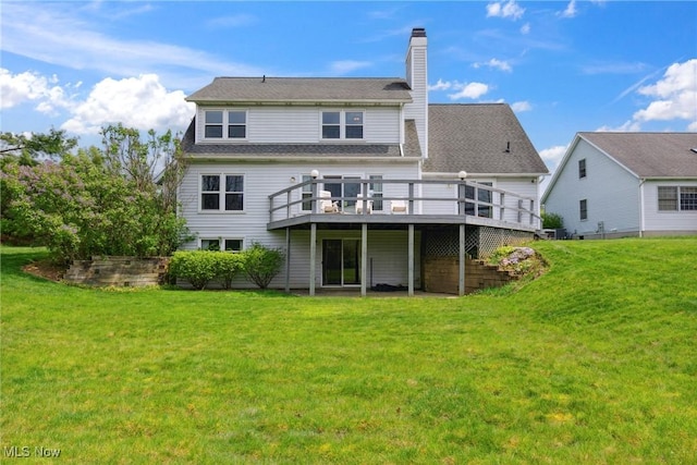 5420 Crystal Cove Cir, Stow, OH 44224 - rear view of house with a lawn, a chimney, and a deck
