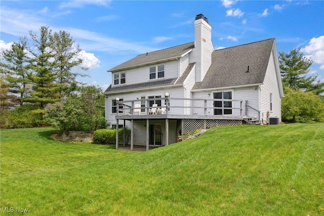 5420 Crystal Cove Cir, Stow, OH 44224 - rear view of house with a lawn, a wooden deck, a chimney, and roof with shingles