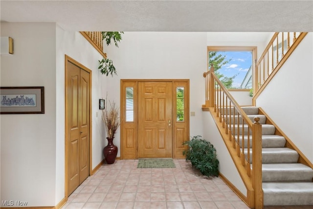5420 Crystal Cove Cir, Stow, OH 44224 - foyer entrance with baseboards and stairway