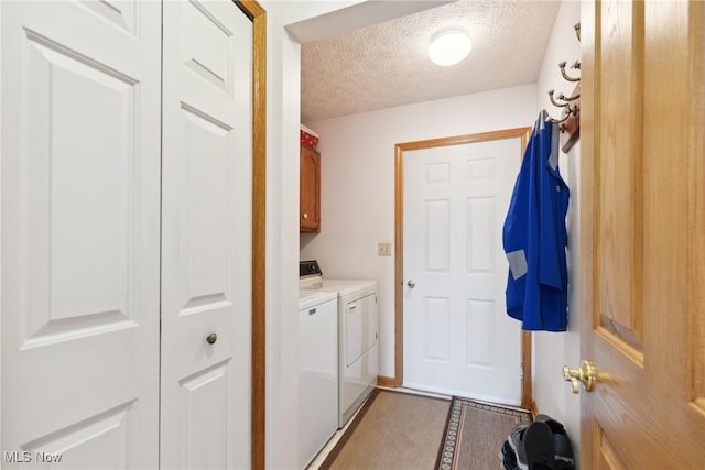 5420 Crystal Cove Cir, Stow, OH 44224 - washroom featuring cabinet space, a textured ceiling, and washing machine and dryer