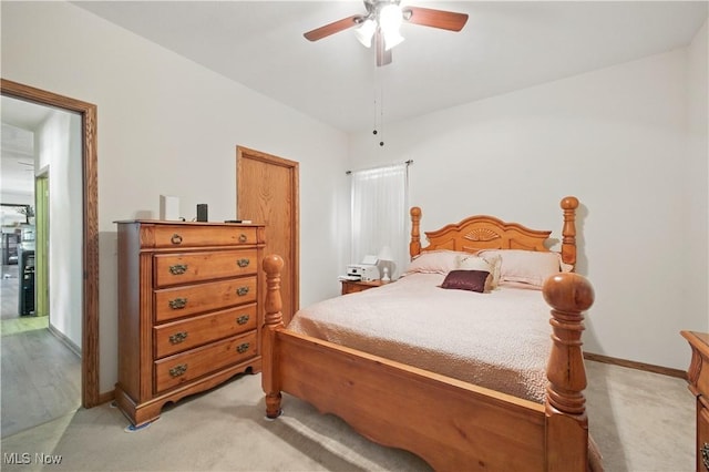 16544 Davis Dr, Calcutta, OH 43920 - bedroom with ceiling fan, light colored carpet, and baseboards