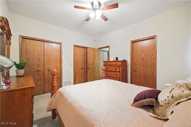 16544 Davis Dr, Calcutta, OH 43920 - carpeted bedroom with multiple closets, ceiling fan, and visible vents