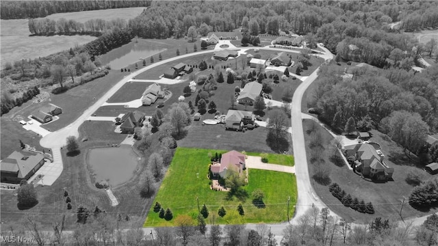 16544 Davis Dr, Calcutta, OH 43920 - aerial view with a residential view and a wooded view