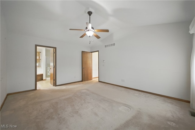 16544 Davis Dr, Calcutta, OH 43920 - unfurnished bedroom with light colored carpet, baseboards, visible vents, and lofted ceiling
