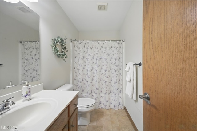 16544 Davis Dr, Calcutta, OH 43920 - bathroom with visible vents, curtained shower, toilet, and vanity