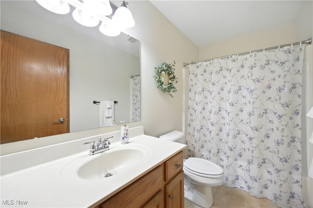 16544 Davis Dr, Calcutta, OH 43920 - full bath with vanity, tile patterned floors, toilet, and a shower with curtain