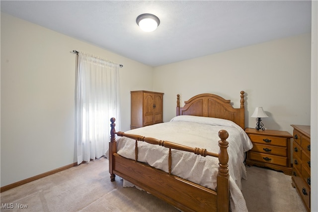 16544 Davis Dr, Calcutta, OH 43920 - bedroom featuring baseboards and light colored carpet