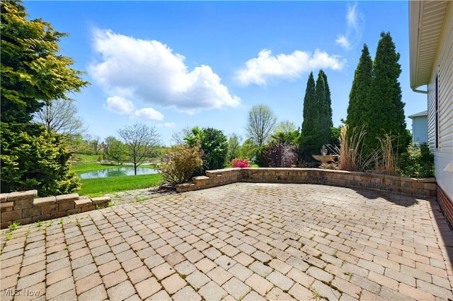 16544 Davis Dr, Calcutta, OH 43920 - view of patio with a water view