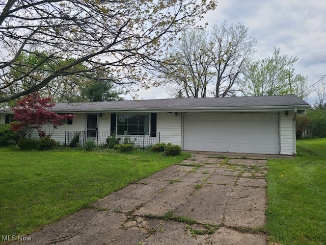 1485 Pike Pkwy, Streetsboro, OH 44241 - ranch-style home featuring a garage, covered porch, a front yard, and concrete driveway