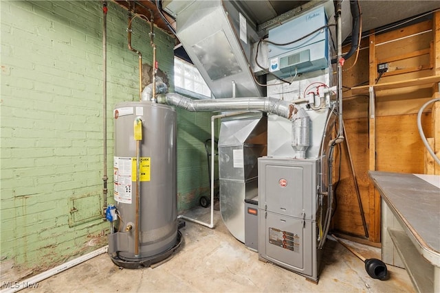 utility room featuring water heater