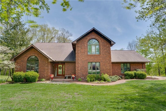 155 Richwood Ct, Belpre, OH 45714 - view of front of property featuring brick siding, a shingled roof, and a front yard