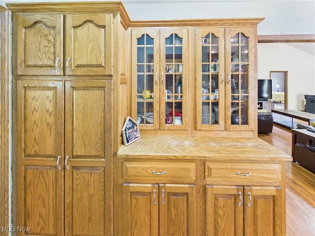 155 Richwood Ct, Belpre, OH 45714 - kitchen featuring butcher block countertops, wood finished floors, and glass insert cabinets