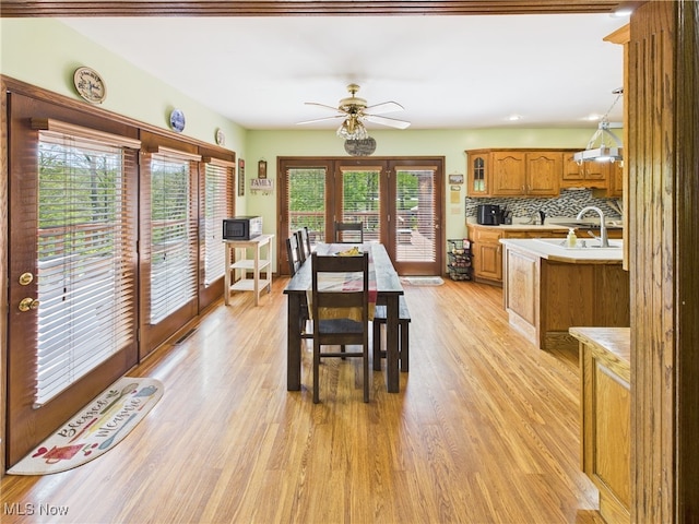 155 Richwood Ct, Belpre, OH 45714 - dining area featuring french doors, plenty of natural light, and light wood-type flooring