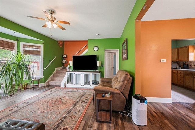 294 Jennings Ave, Salem, OH 44460 - living area with baseboards, stairs, ceiling fan, and wood finished floors