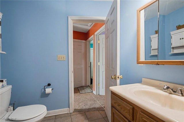 294 Jennings Ave, Salem, OH 44460 - bathroom featuring toilet, baseboards, tile patterned flooring, and vanity