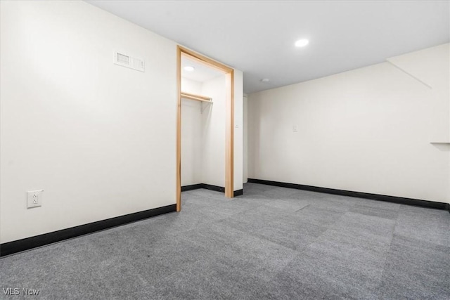 unfurnished bedroom with carpet floors, baseboards, recessed lighting, and visible vents