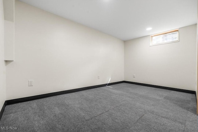 unfurnished room featuring recessed lighting, baseboards, and carpet