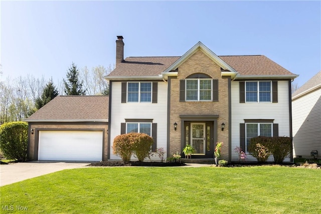 colonial home with a garage, a front lawn, roof with shingles, a chimney, and concrete driveway