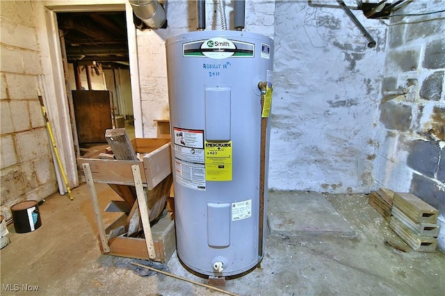 11680 Walnut Ave NE, Alliance, OH 44601 - utility room featuring water heater