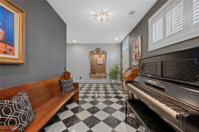 living area featuring baseboards, tile patterned floors, recessed lighting, and visible vents