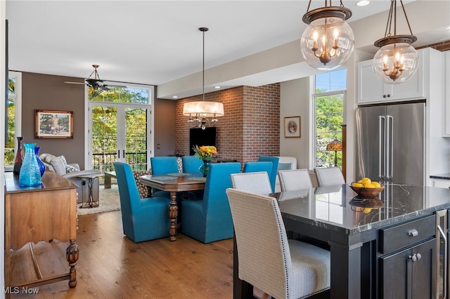 dining room with hardwood / wood-style flooring