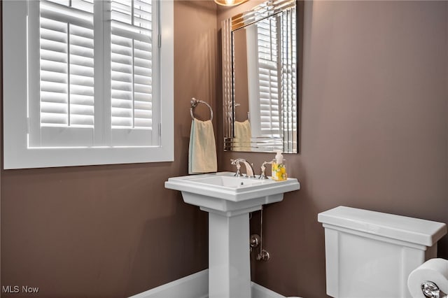 bathroom featuring toilet