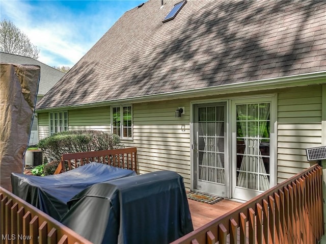wooden terrace featuring central AC