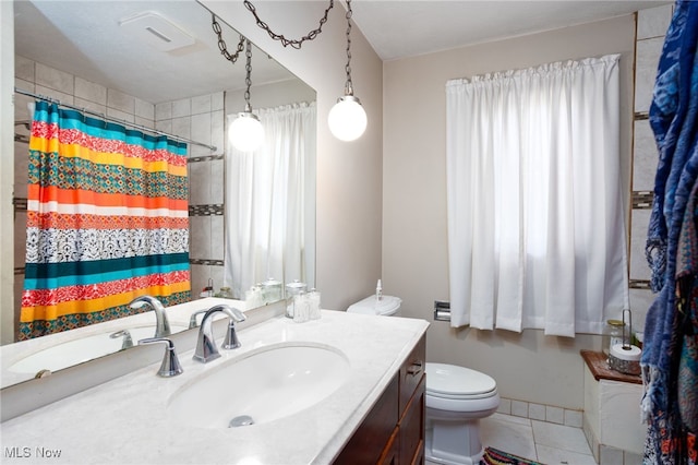 4299 Weymouth Rd, Medina, OH 44256 - full bath with a healthy amount of sunlight, tile patterned floors, vanity, and toilet