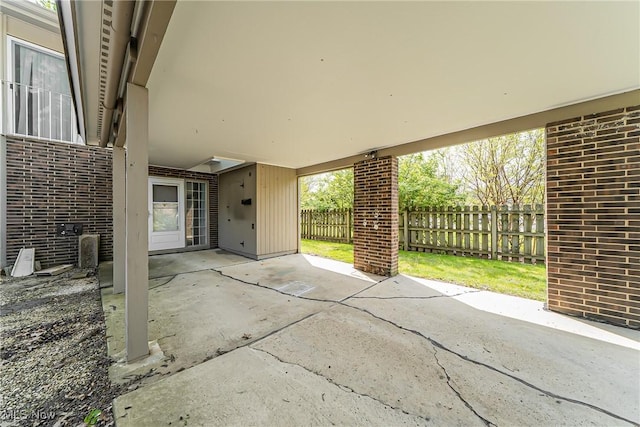 view of patio / terrace featuring fence