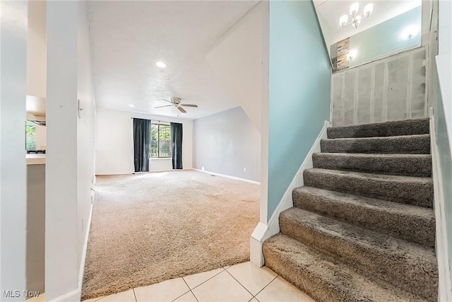 stairs with a ceiling fan, tile patterned flooring, baseboards, carpet flooring, and recessed lighting