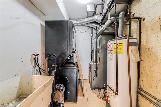 utility room with a sink and gas water heater