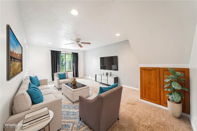 carpeted living room featuring recessed lighting, ceiling fan, and baseboards