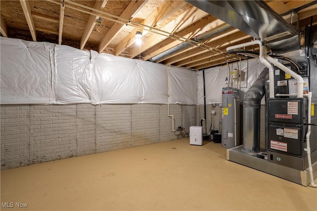 3939 Higgins Dr, Norton, OH 44203 - unfinished below grade area with heating unit and electric water heater