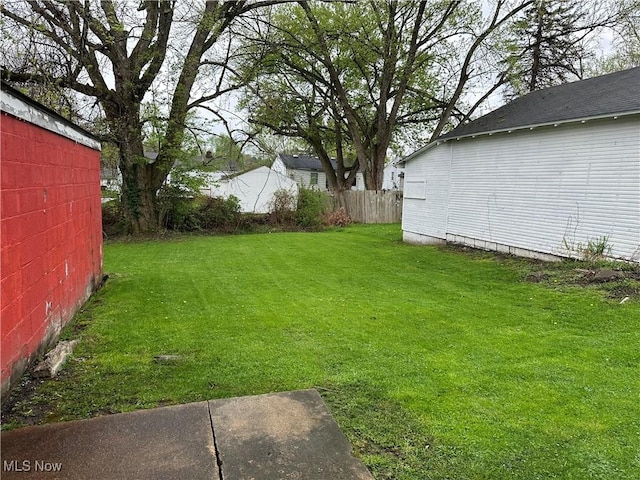 view of yard with fence