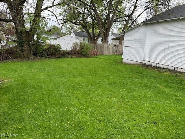 view of yard with fence
