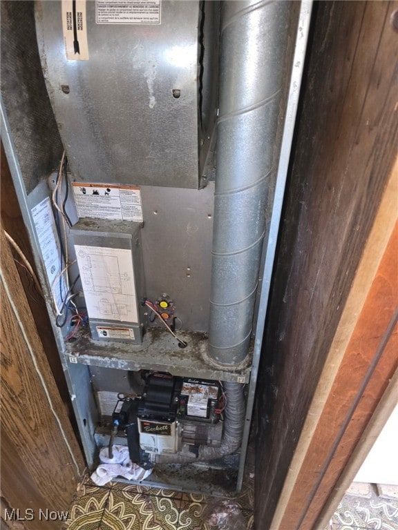 5961-5971 Streeter, Mantua, OH 44255 - utility room with heating unit