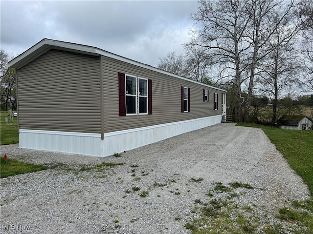 46115 US Highway 36, Coshocton, OH 43812 - view of side of property with gravel driveway