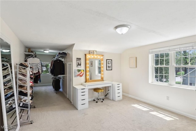 692 Roslyn Ave, Akron, OH 44320 - interior space with baseboards and light carpet
