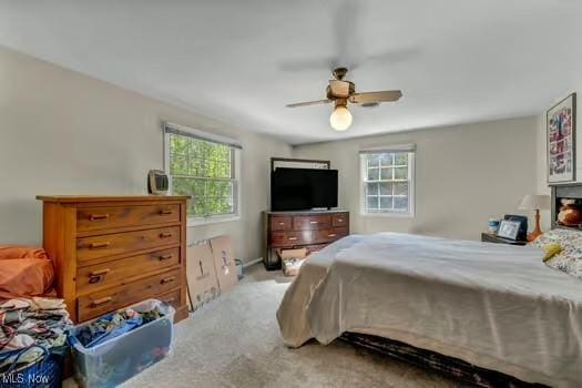bedroom with carpet floors and ceiling fan