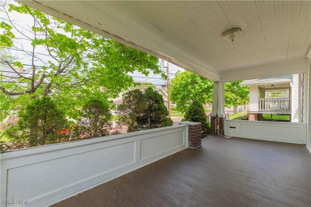view of patio featuring a porch