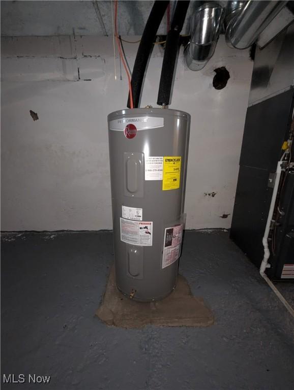 810 Pine St, Coshocton, OH 43812 - utility room with water heater