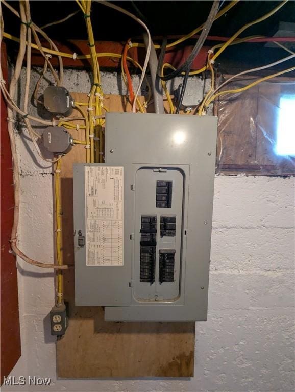 810 Pine St, Coshocton, OH 43812 - utility room featuring electric panel