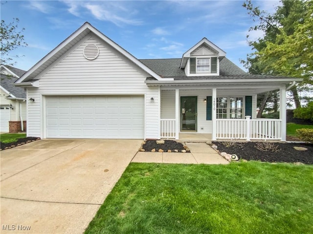 view of front of home featuring roof with shingles, a front lawn, a garage, a porch, and driveway